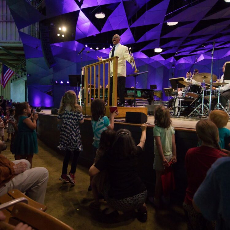 The audience enjoys Byron Stripling singing on stage.