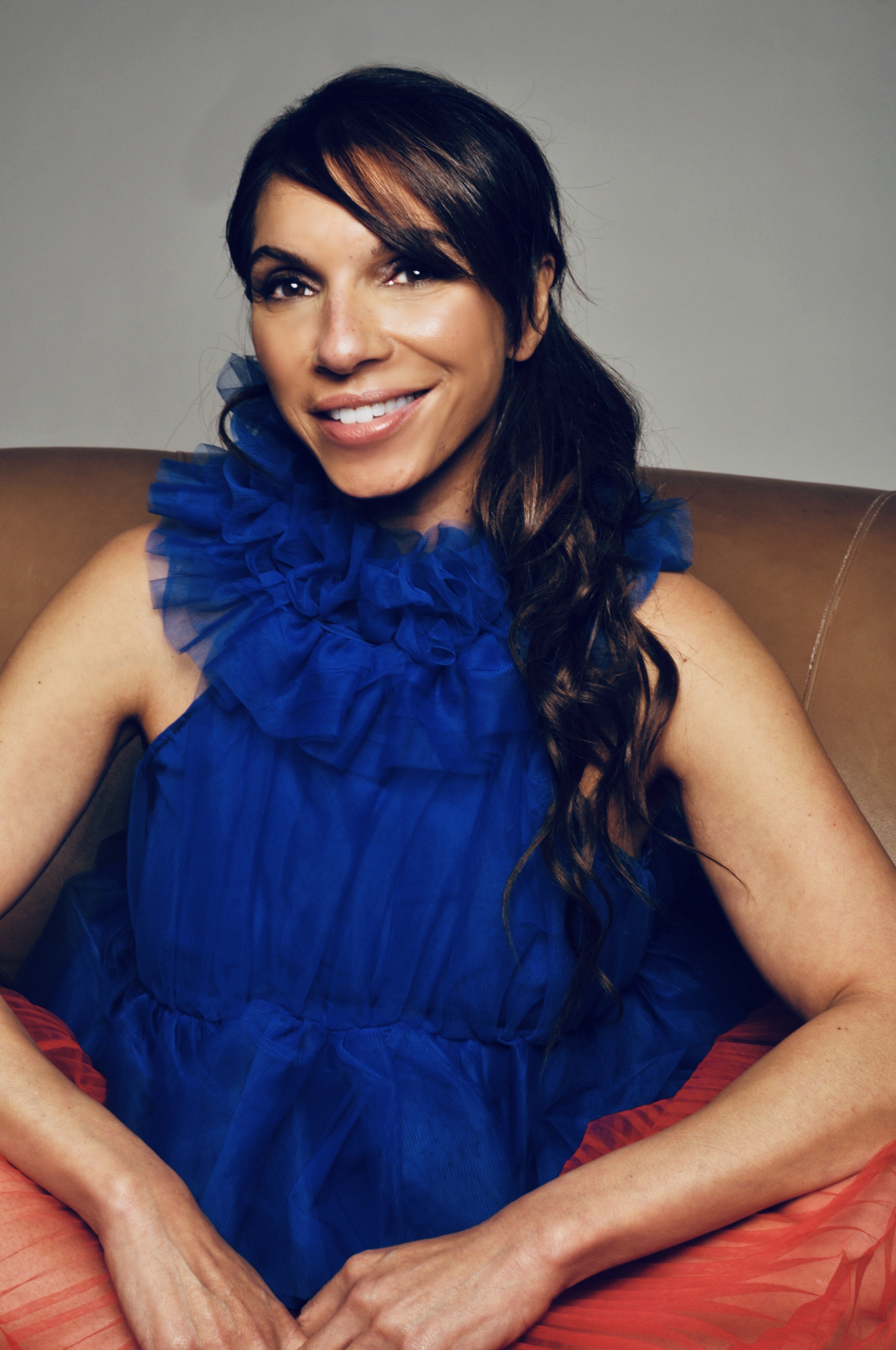 Lara Downes headshot wearing a blue top
