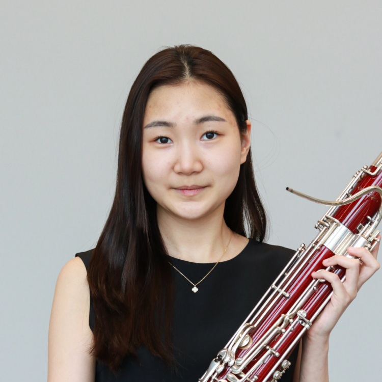 2023 BSO Concert Competition Winner Ye Sol (Joanna) Yi holding a bassoon