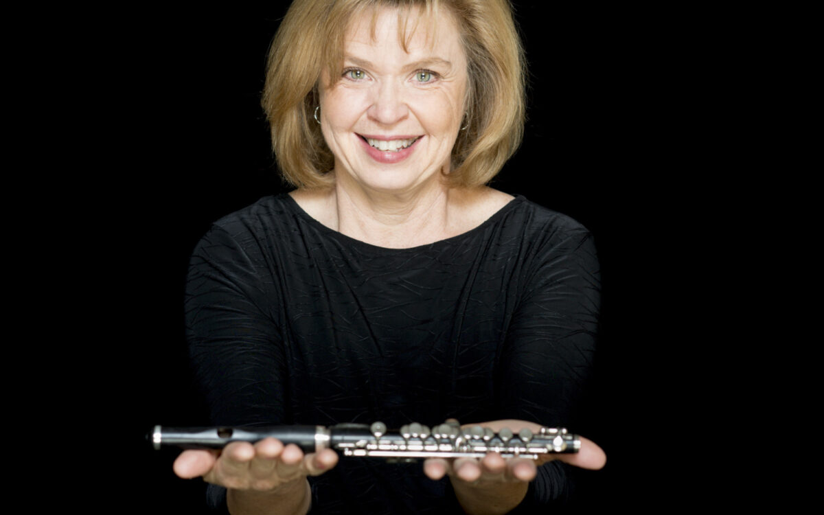 Cynthia Meyers headshot with piccolo
