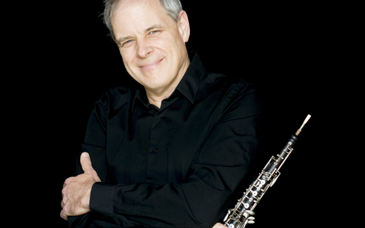 John Ferrillo headshot with oboe