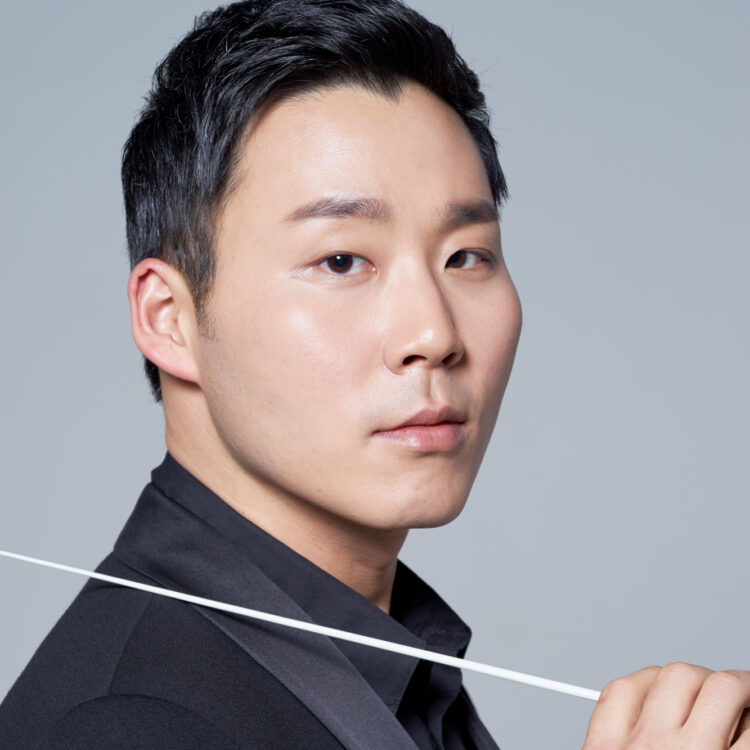 Earl Lee headshot with baton