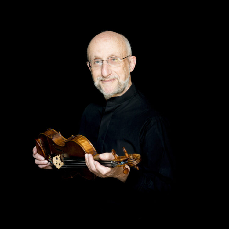 Ronan Lefkowitz headshot with violin