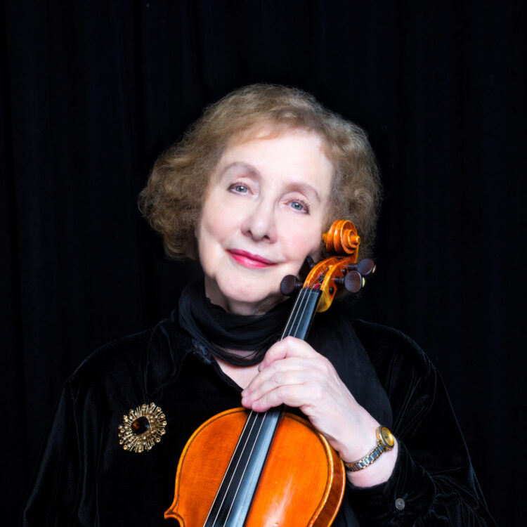 Valeria Vilker Kuchment headshot with violin