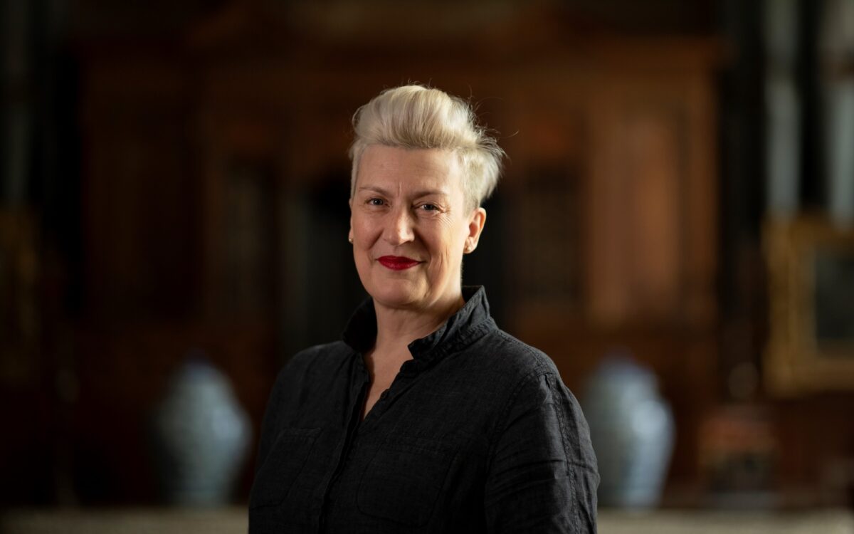 Sarah Connolly standing in front of a blurred background