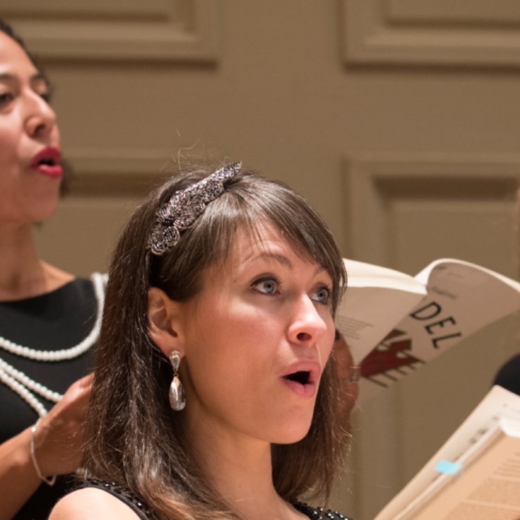 Handel and Haydn society chorus singers on stage at Symphony Hall in Boston